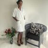 Brides white satin gown black piping